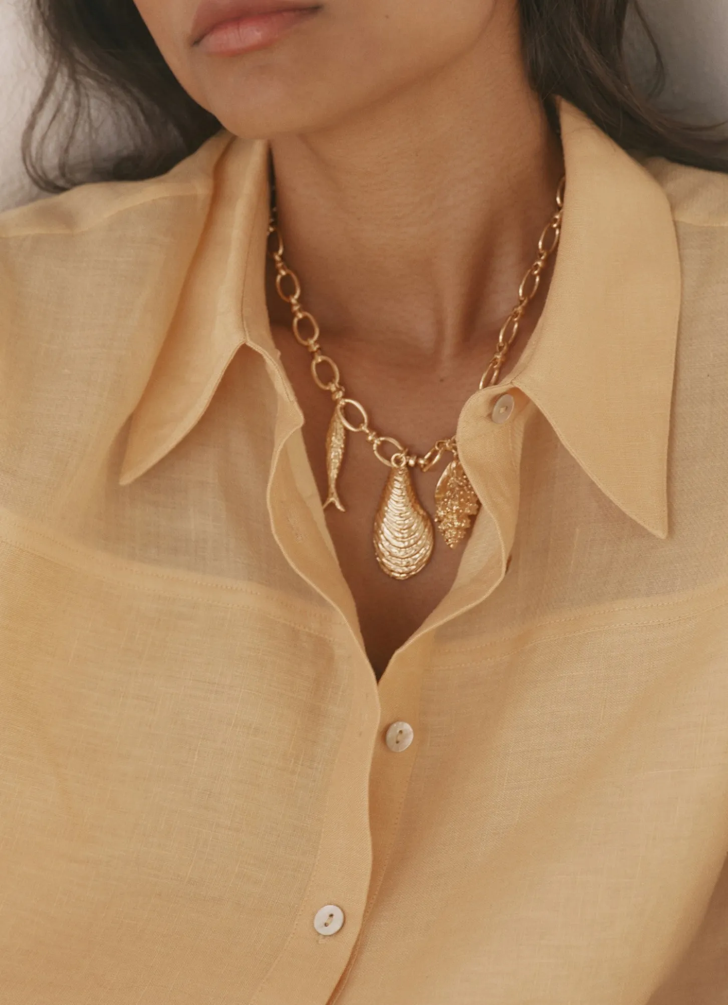 Gold Tone Shell Statement Charm Necklace