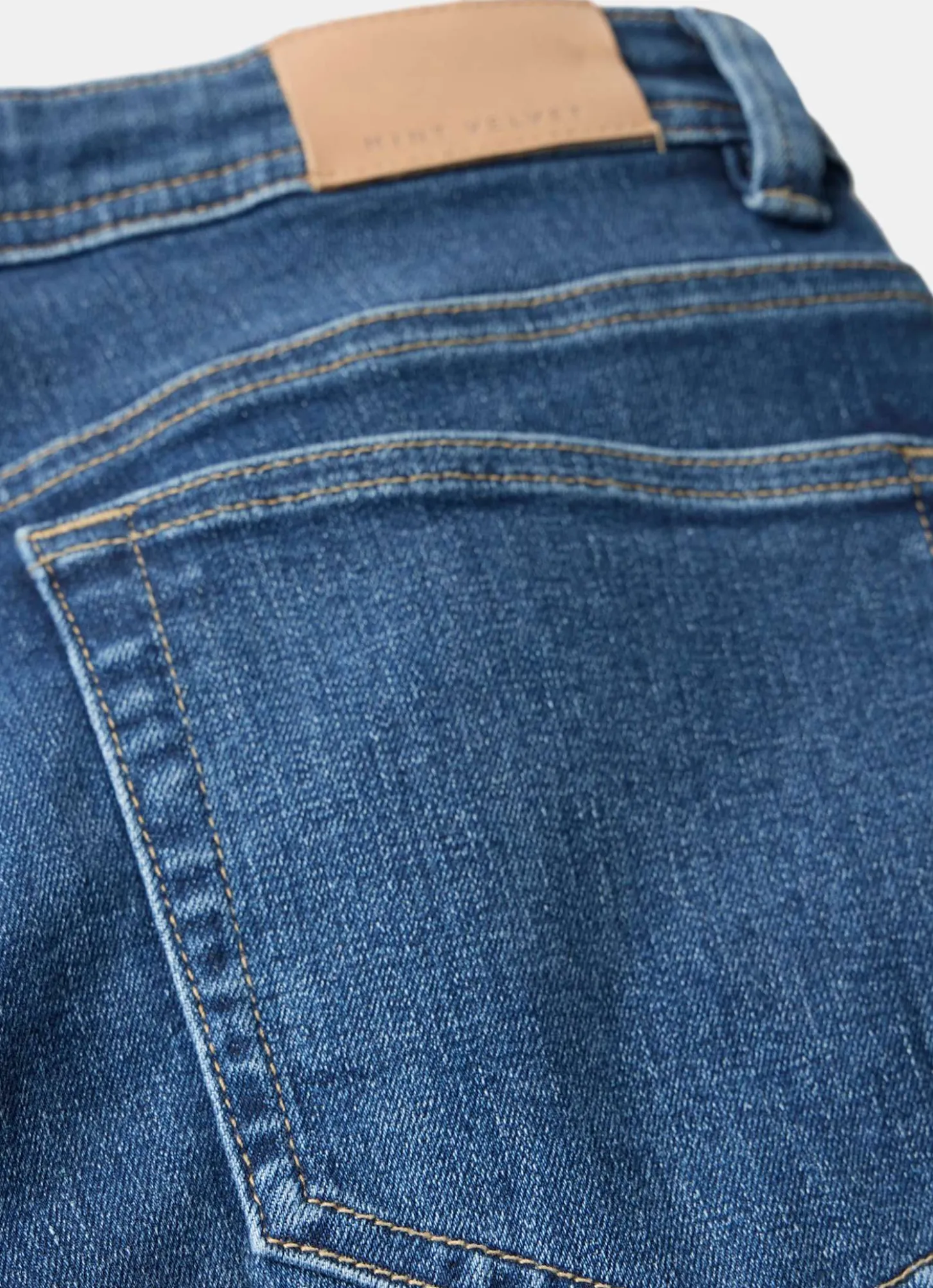 Mid Indigo Sculpting Skinny Jeans